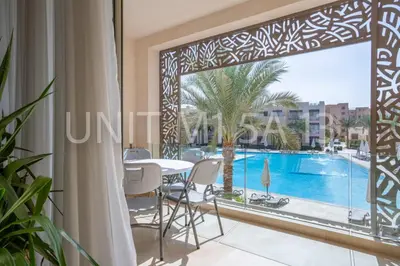 a bedroom apartment with a view of the swimming pool at Elgouna Heart Mangroovy new 2bedrooms in Hurghada