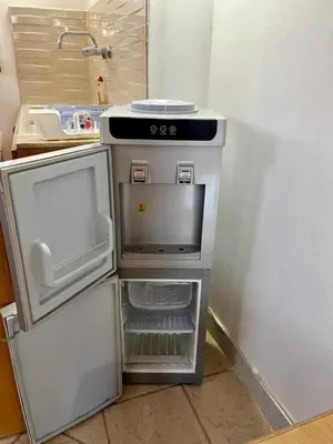 a refrigerator with its door open in a kitchen at Downtown ElGouna Excellent Location in Hurghada