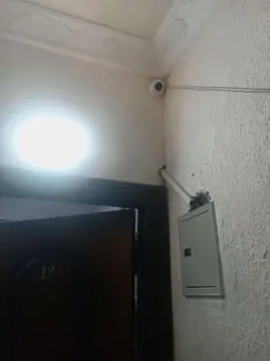 a corner of a room with a light on the wall at App12 - RAWDA - Enjoy the privacy of staying in a quiet apartment with free Wi-Fi as your complete second home in the heart of Hurghada in Hurghada
