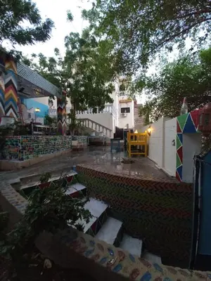 a view of a playground with stairs and a building at Private House with Garden and terrace in Aswan in Aswan