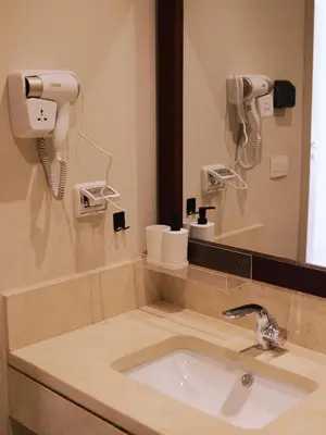 a bathroom with a sink and a mirror at Mangroovy apartament El gouna in Hurghada