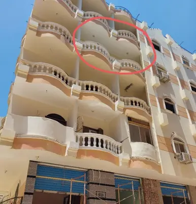 a building with balconies on the side of it at STAR HOME HURGHADA ARABIA in Hurghada