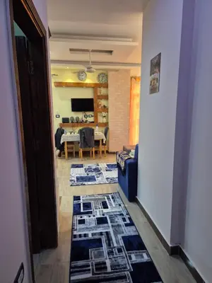 a hallway with a living room and a dining room at STAR HOME HURGHADA ARABIA in Hurghada
