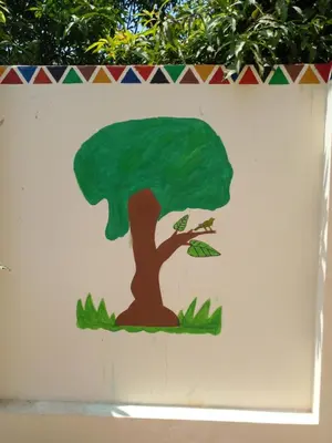 a painting of a tree on the side of a wall at Tasneem Palace in Luxor