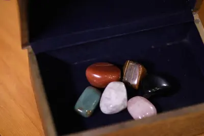 a box filled with different colored chocolates at Benben by Dhara Hotels - Adults Only in Aswan
