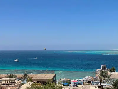 a view of the ocean with boats in the water at Marvel flat in Hurghada