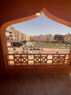 a view of a parking lot from a window at Boho Homes in Hurghada