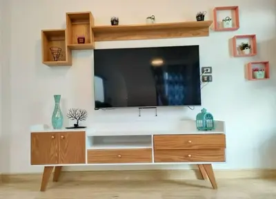 a large television on a white wall in a living room at Amaros Sahl Hasheesh sea view Villa with Pool سهل حشيش in Hurghada