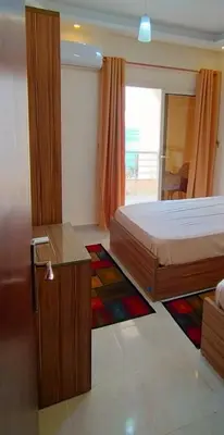 a bedroom with a bed and a window at Casablanca Beach Hurgada in Hurghada