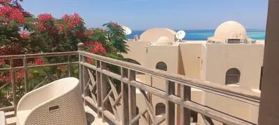 a balcony with a view of the ocean at The view studio in Hurghada