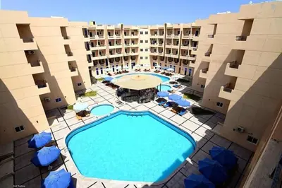 an overhead view of a swimming pool in a hotel at Tiba Resort F22 Near to ElGouna in Hurghada
