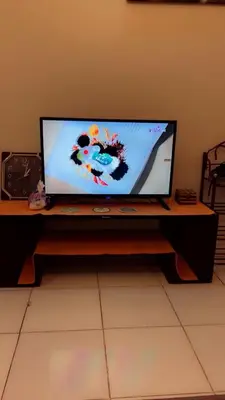 a flat screen tv sitting on top of a table at Hossam Comfort Apartment El Hadaba Hurghada in Hurghada
