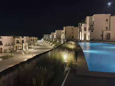 a view of a swimming pool at night at Villa for you on your own in Makadi Heights, Hurghada, Read Sea, Egypt in Hurghada