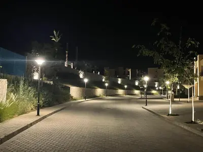 an empty street at night with street lights at Villa for you on your own in Makadi Heights, Hurghada, Read Sea, Egypt in Hurghada