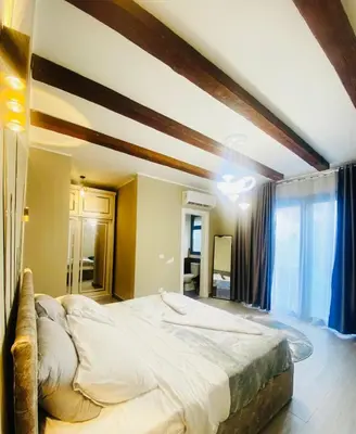 a bedroom with a large bed in a room at LuxVilla 1 BHK W Private Heated Pool in Bali El Gouna in Hurghada