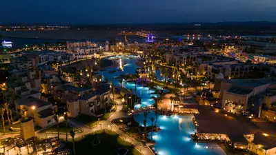 an aerial view of a city at night at Pickalbatros Sands Port Ghalib in Port Ghalib