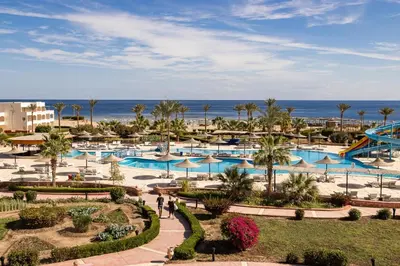 a view of the pool at a resort at Bliss Nada Beach Resort in Coraya Bay