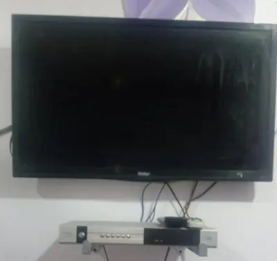 a computer monitor sitting on top of a table at Yasin - Enjoy the privacy of staying in a quiet apartment with free Wi-Fi as your complete second home in the heart of Hurghada in Hurghada