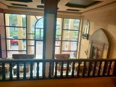 a view from the balcony of a building at VIVA Andalouse luxury family suite, private beach & pool, NO ORFI in Hurghada