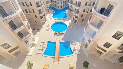 an overhead view of a swimming pool in a building at Central location Aqua Tropical Resort Al Gouna RD 401 in Hurghada