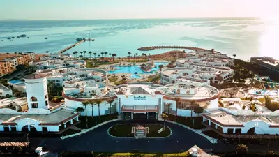 an aerial view of a resort near the ocean at Sunrise Alma Bay Resort in Hurghada
