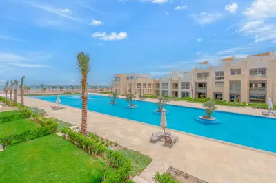 an image of a swimming pool at a resort at Mangroovy 2 Bedroom Sea View Apartment, Pool & Beach in Hurghada