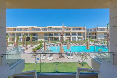a view of the pool at a resort at Boho-Chic Studio Apartment in G-Cribs, Pool View in Hurghada