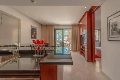 a kitchen with a sink and a counter top at Classy 1-Bedroom Apartment in Ancient Sands with Pool View in Hurghada