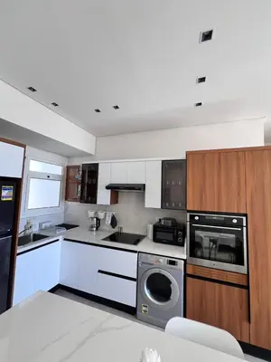 a kitchen with a washer and a dishwasher at Stayr Somabay - Bay Life Home Rentals in Hurghada