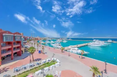 a view of a marina with boats in the water at Outstanding Apartment with Marina Hurghada view in Hurghada