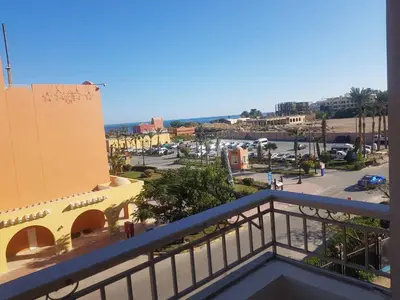 a view of a city from a balcony at Outstanding Apartment with Marina Hurghada view in Hurghada