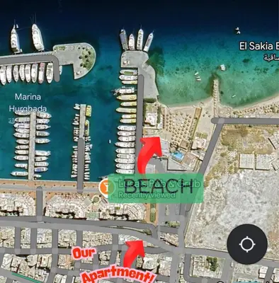 a map of the beach club resort with a map of the resort at Outstanding Apartment with Marina Hurghada view in Hurghada