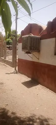a air conditioner on the side of a building at Hamd Nubian Guest House in Aswan