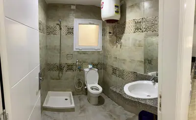 a bathroom with a toilet and a sink at selena bay in Hurghada