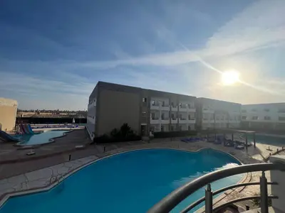 a view of a swimming pool at a hotel at Compound cecelia in Hurghada