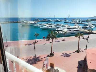a view of a marina with boats in the water at new marina . your best choice for family in Hurghada