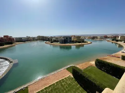arial view of a river with houses and buildings at Luxury 3BR Townhouse, Tawila, El Gouna, Lagoon & Pool access in Hurghada