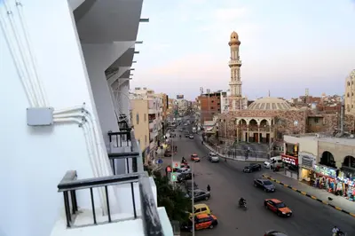 a view of a city street with a clock tower at Lamera Hotel in Hurghada