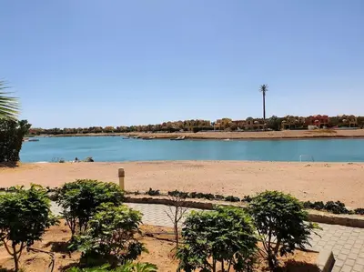 a view of a body of water with trees at Brand New Waterfront Sabina Ground Floor Home in Hurghada