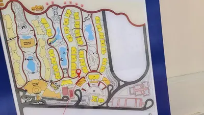 a drawing of a map of a resort at Oyster Bay Beach Resort - Luxury Serviced Condo in Marsa Alam City