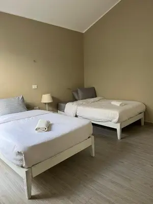two beds sitting in a room with at 2 Bedroom villa with private heated pool in Gouna in Hurghada