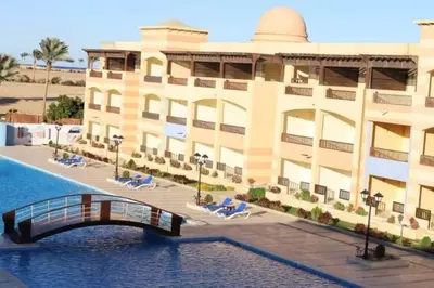 a rendering of a hotel with a bridge over a body of water at fully finished, very cozy and comfortable studio -Marina city Residence in Port Ghalib