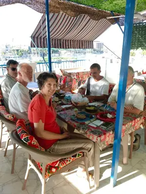 a group of people sitting at a table at Airkela Nuba Dool 2 in Aswan