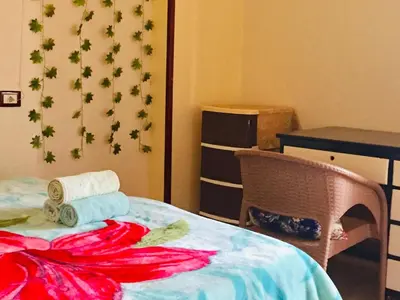 a room with a table with a towel on it at sun smile guest house᭄ꦿ in Luxor