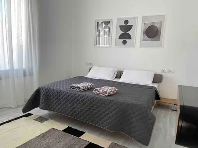 a bedroom with a bed with two pillows on it at 2 bd with private heated pool in Sholan 2 El Gouna in Hurghada