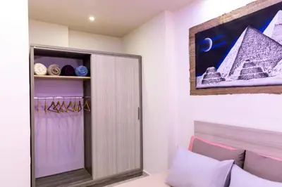 a room with a closet with a mirror at F&M Home Egypt - Apartment Hurghada in Hurghada