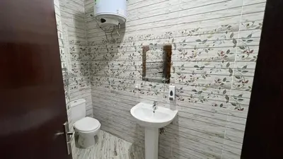 a bathroom with a sink and a toilet at Casablanca beach resort, first line with private beach and swimming pools, in Hurghada