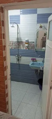 a bathroom with a shower and a sink at NUBA ONe in Aswan