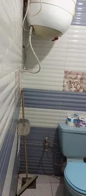 a bathroom with a toilet and a sink at NUBA ONe in Aswan