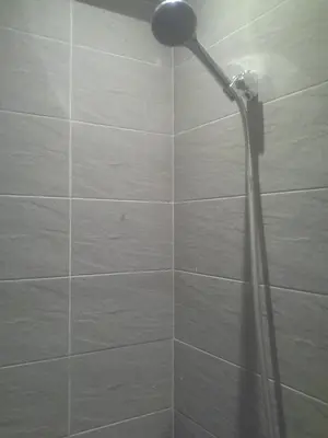 a shower with a shower head in a bathroom at Princess resort unit number 260A Markos in Hurghada